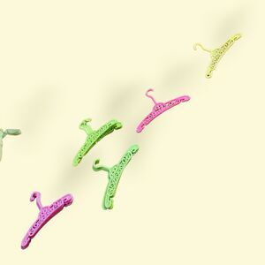 Bundle of vintage Barbie hangers